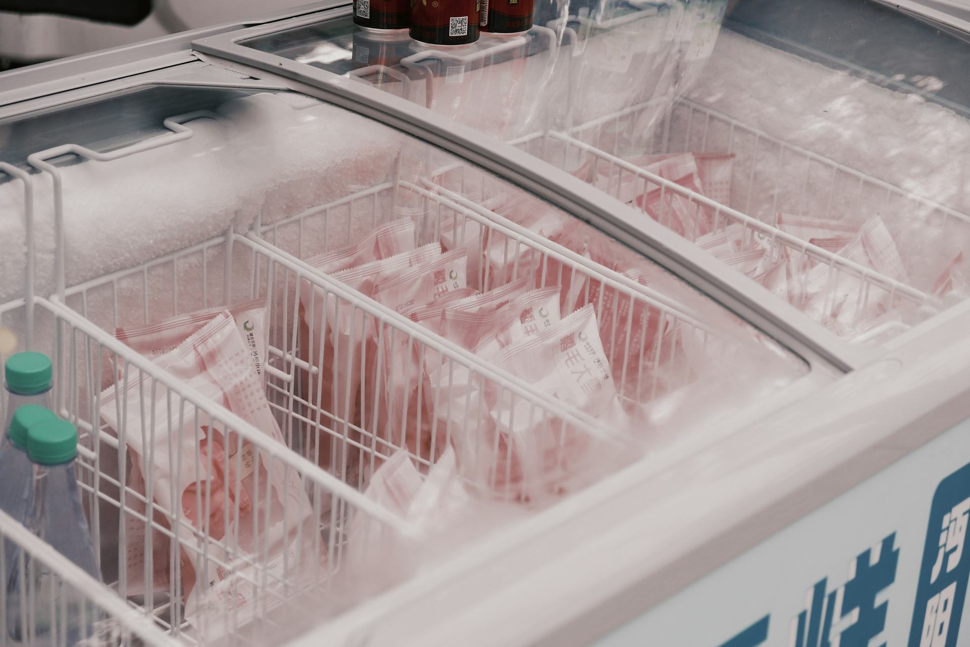 Frost on packaged food in a chest freezer